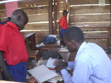 Child and teacher at school