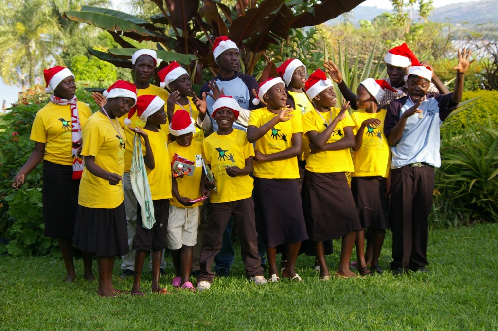SALVE children wearing santa hats
