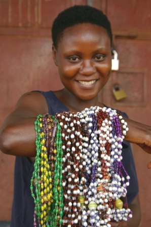 KIRABIRA HARRIET Kirabira Harriet is married with 5 dependants. Using the bead making skills she has learnt from the project, Harriet also makes beads in her own time along with bags which she then sells.