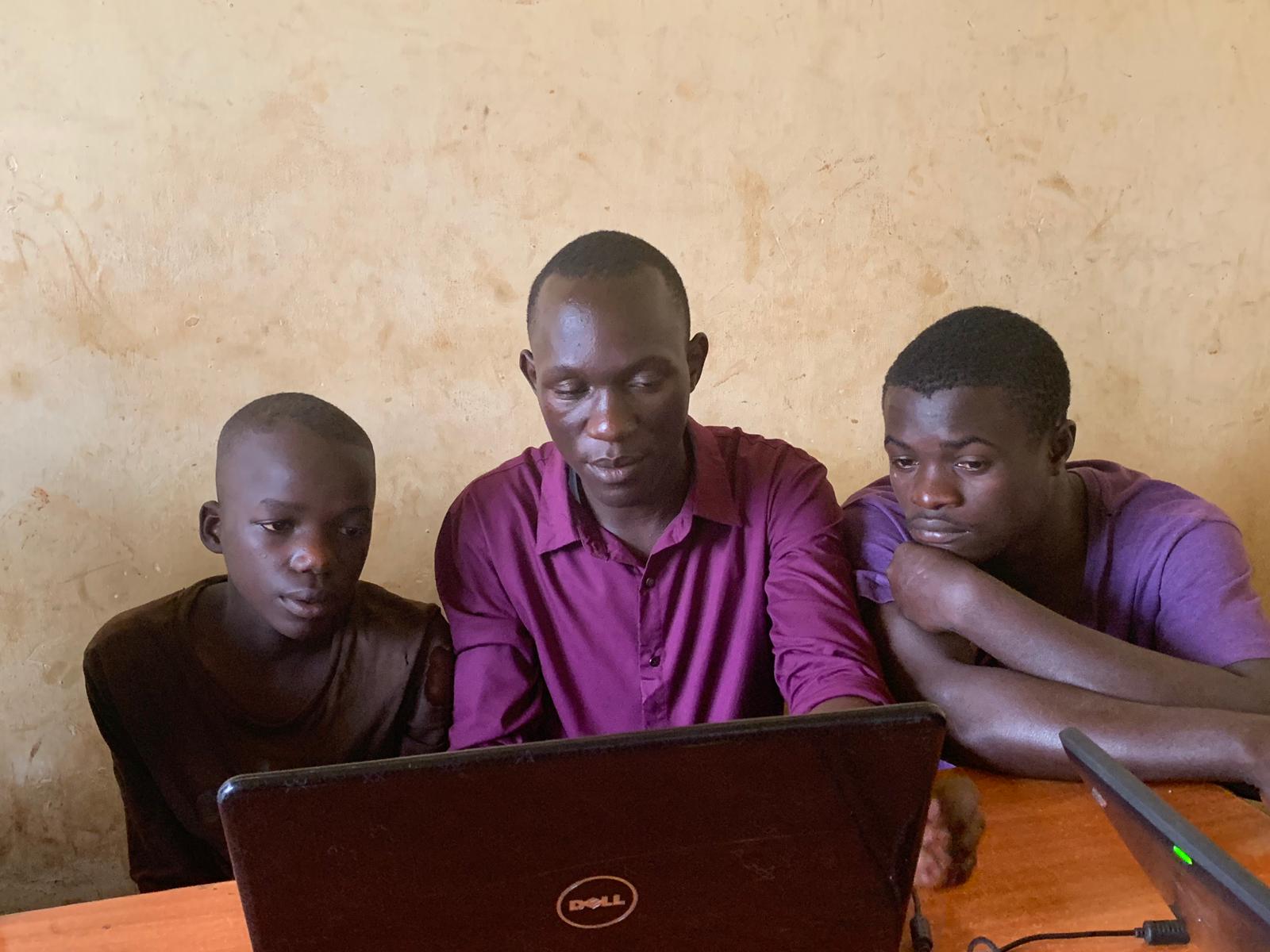 young people on a laptop