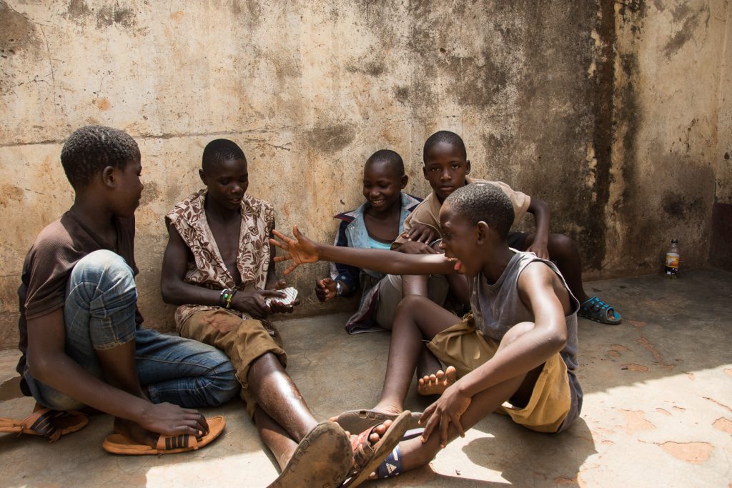 children sat on the street