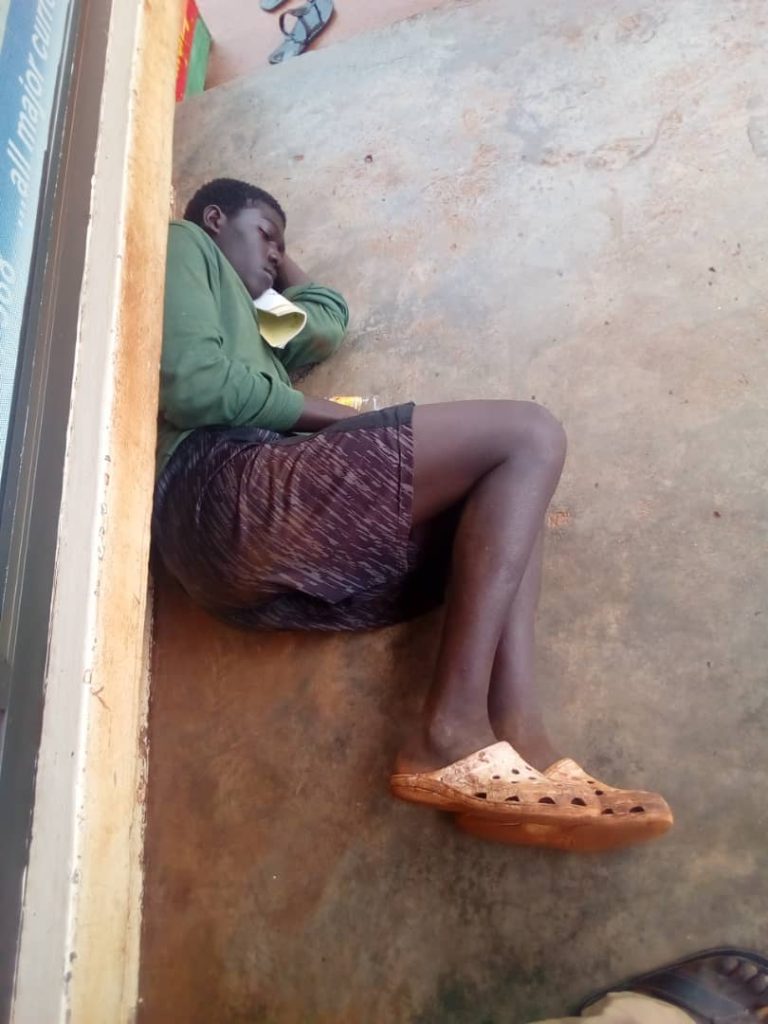 a child sleeps on the street
