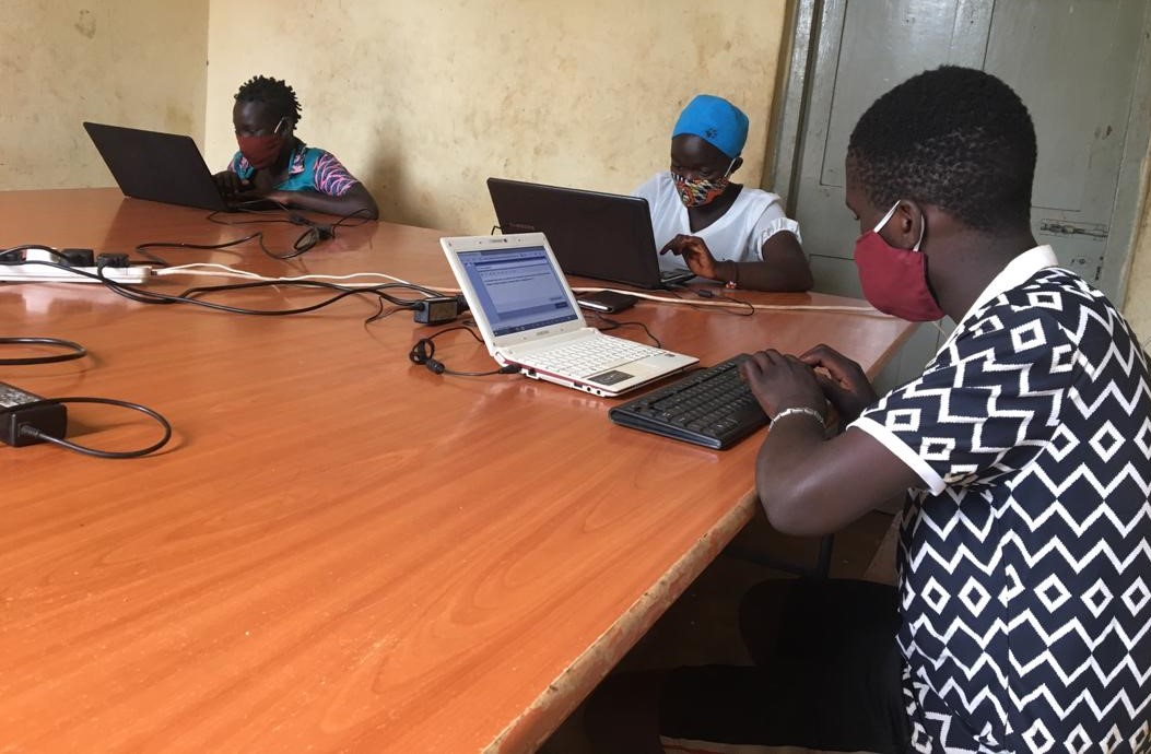 Ugandan children learning about pollution