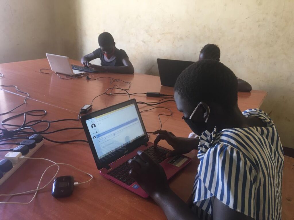 children learning about climate change in Uganda