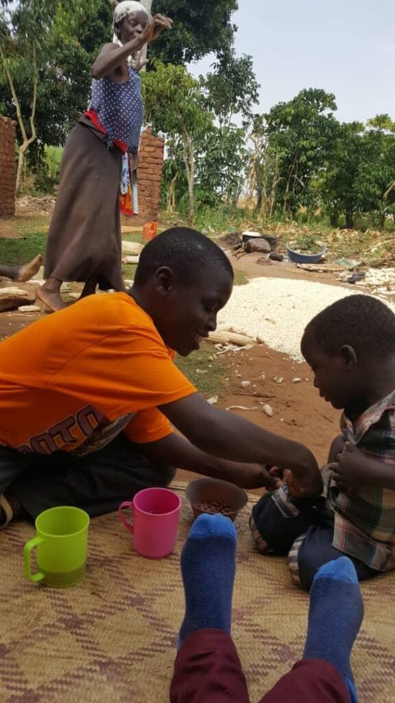2 boys play in Uganda