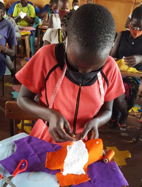 Making reusable sanitary pads in Uganda