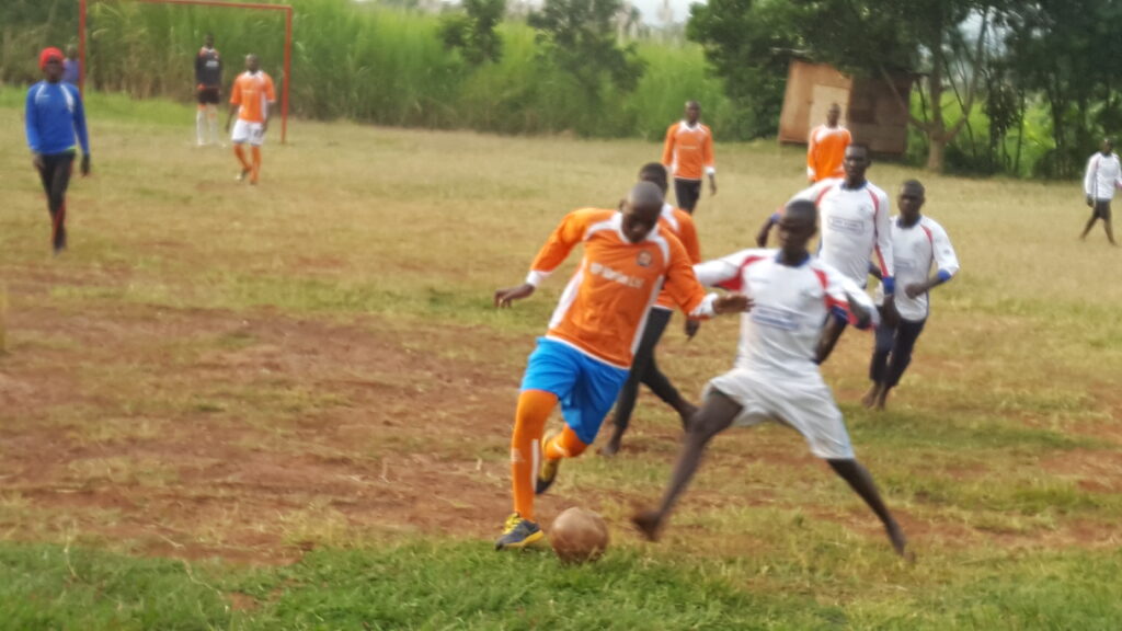 children playing football