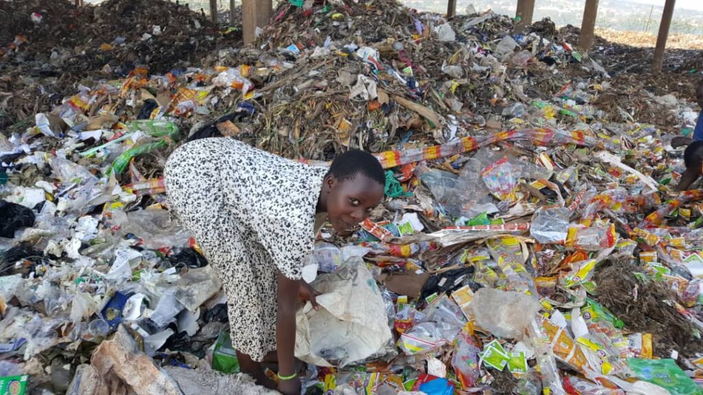 a child collects rubbish