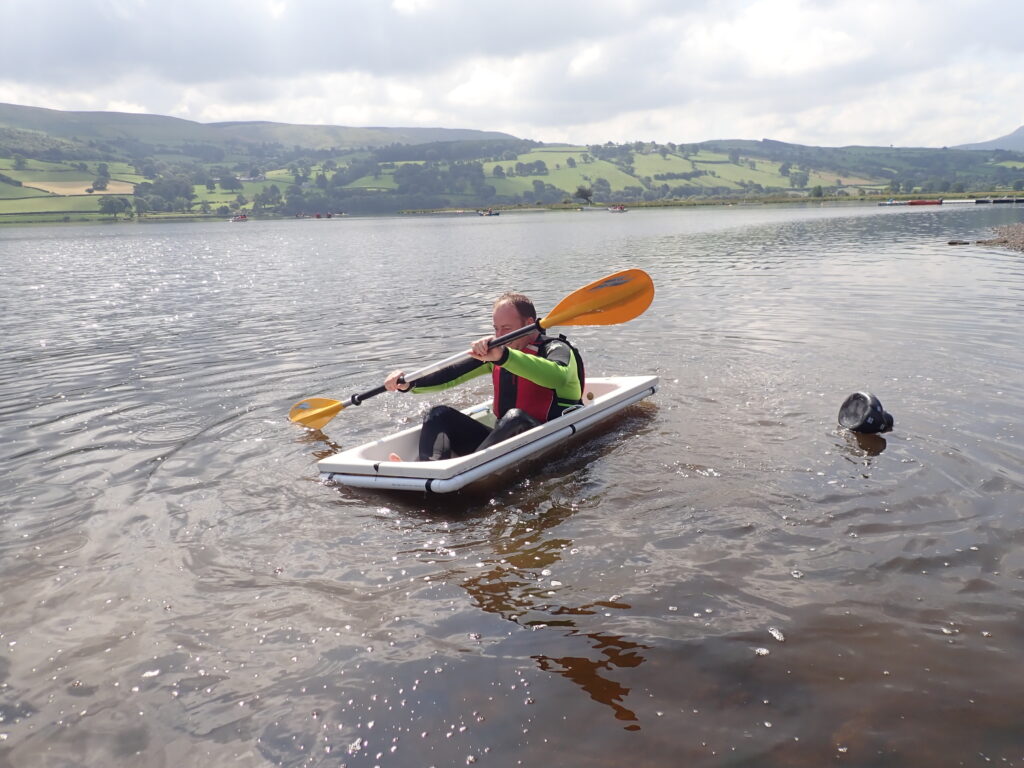 paddling on a lake in a bathtub