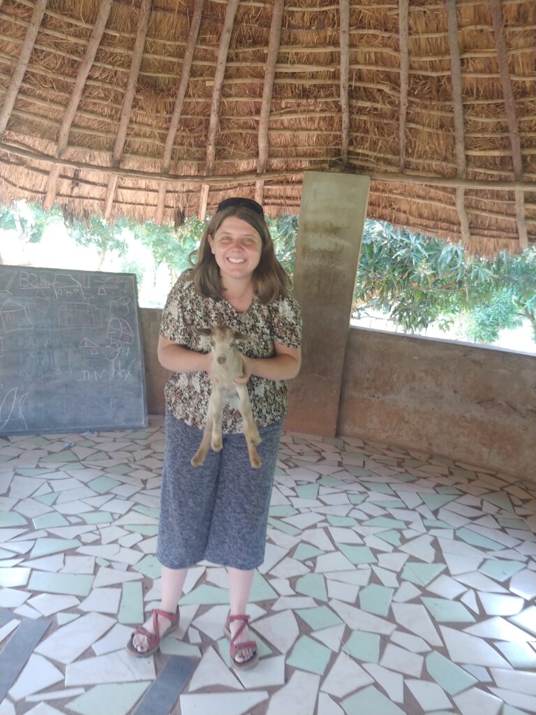 Nicola holding a goat