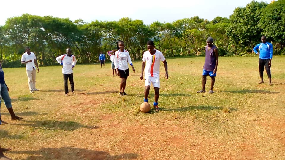 A group of children are having fun playing football together
