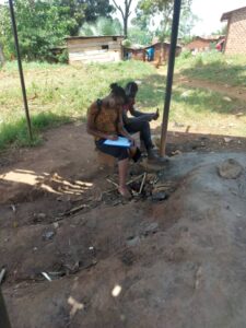 what are your responsibilities at home Two people sat together looking at paper