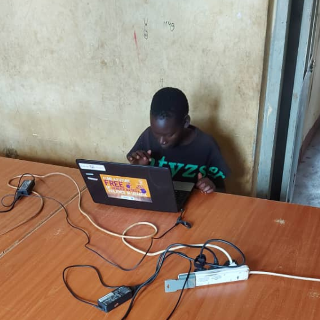 child looking at computer