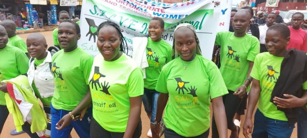 women and girls in SALVE t-shirts on International Womens Day