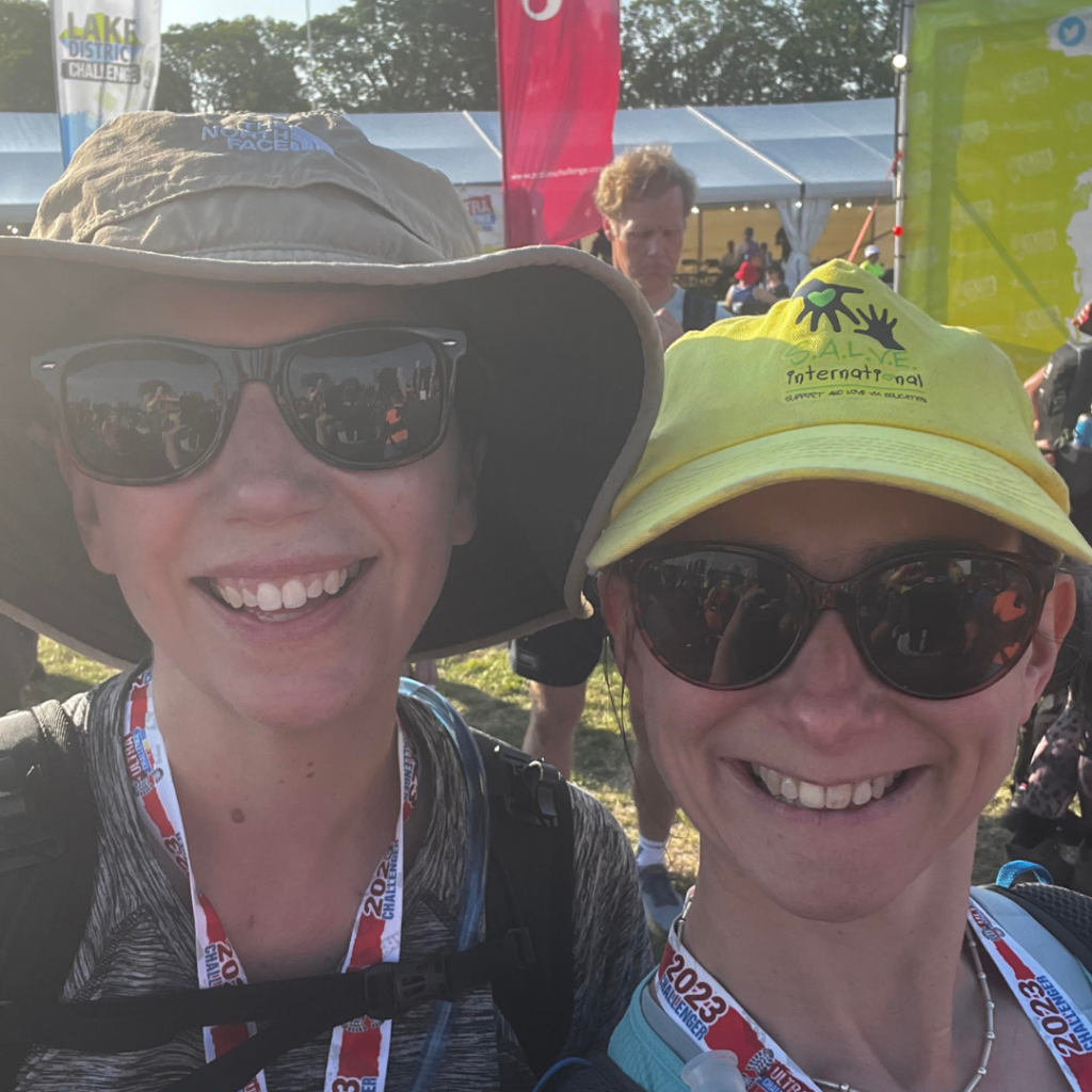 Two women on hike, smiling