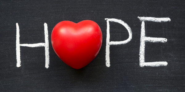 The word hope is written with a heart for the O