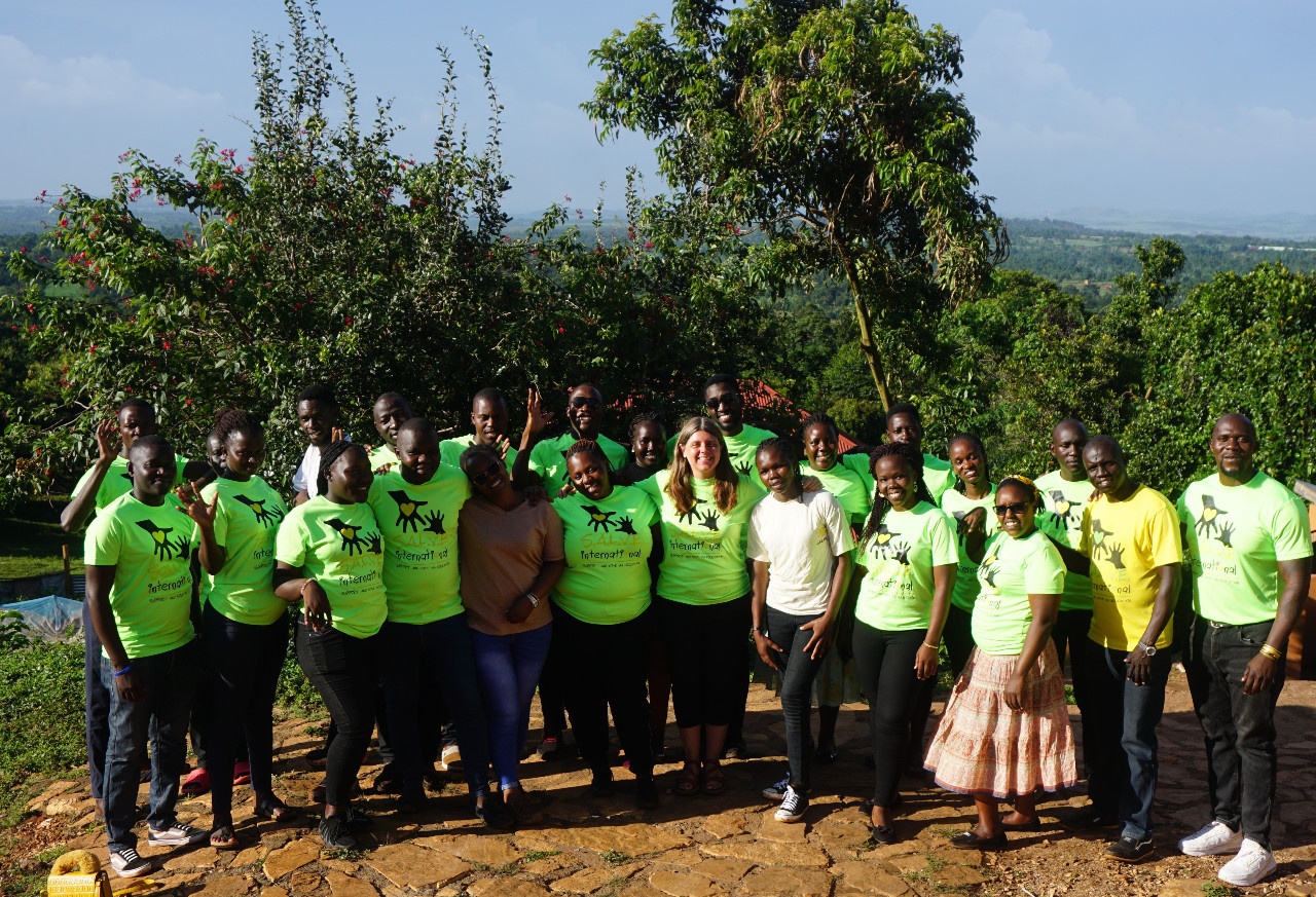 A large group of SALVE staff standing together