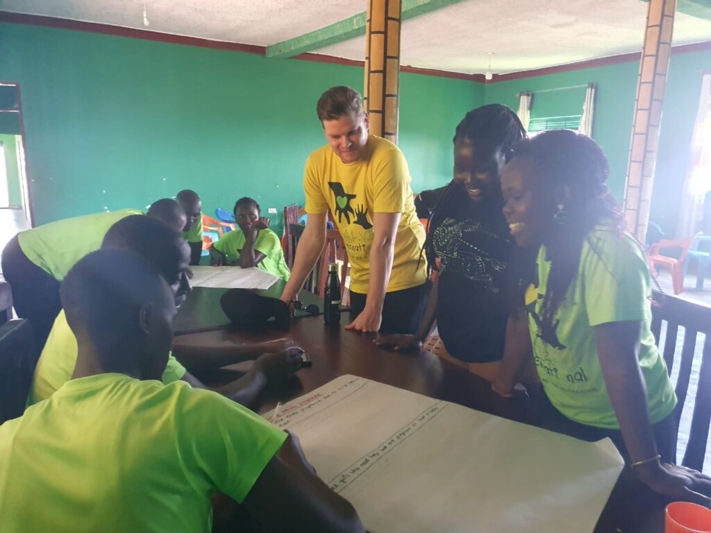 SALVE staff members looking around a table